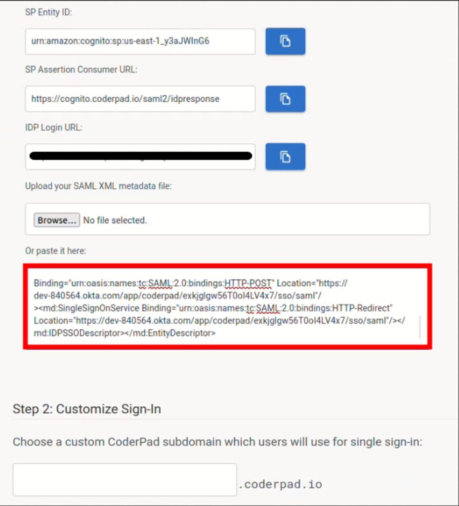 The image shows a screenshot of the SAML configuration settings for CoderPad in Okta. The fields include:

- **SP Entity ID**: `urn:amazon:cognito:sp:us-east-1_y3aJwInG6` with a copy button next to it.
- **SP Assertion Consumer URL**: `https://cognito.coderpad.io/saml2/idpresponse` with a copy button next to it.
- **IDP Login URL**: The URL is redacted with a black box, with a copy button next to it.
- **Upload your SAML XML metadata file**: with a "Browse" button and text "No file selected."
- **Or paste it here**: A text box contains SAML metadata information highlighted in a red box.

Below these fields, there is a section labeled "Step 2: Customize Sign-In," which allows the user to choose a custom CoderPad subdomain for single sign-in, followed by a text box for entering the subdomain ending with ".coderpad.io."