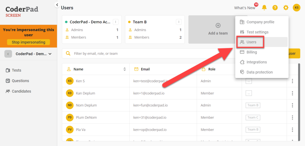 The Users page is shown with the settings menu open in the top right corner and an arrow pointing to the "users" option.