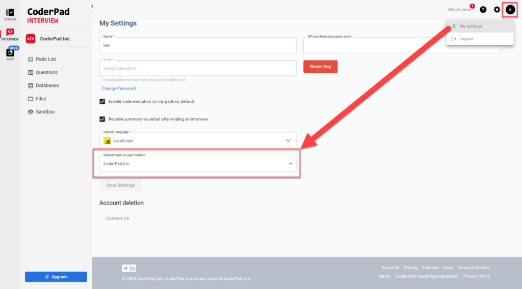 The image displays a settings page within the CoderPad Interview platform. The highlighted section shows the "Default team for pad creation," which is currently set to "CoderPad Inc." There is also a drop-down menu allowing the user to change this setting. Additionally, the arrow points to the top-right corner, where a user icon (with the initial "K") opens a menu containing options like "My Settings" and "Logout." This section allows users to manage their personal settings, including their default language, API key, and other configurations related to pad creation and interview summaries.
The user has the option to save settings using the "Save Settings" button.